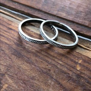 Two Western roped silver rings.